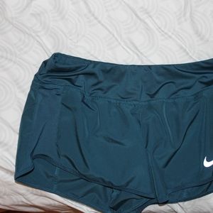 teal nike dry-fit shorts